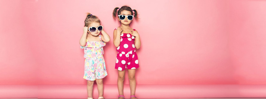 toddler-girls-pink-background-sunglasses-1068x713.jpg